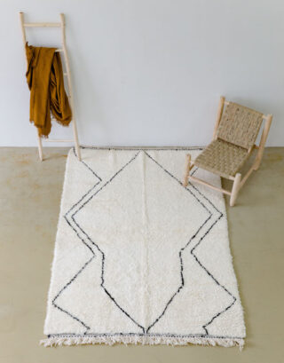 Grand tapis en laine tressée vue du dessus
