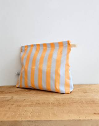 Trousse de voyage cirée • Rayée orange & bleue