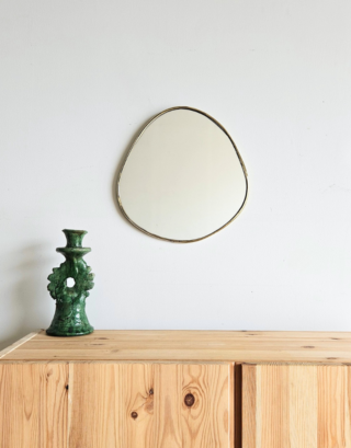 Petit miroir rond irrégulier