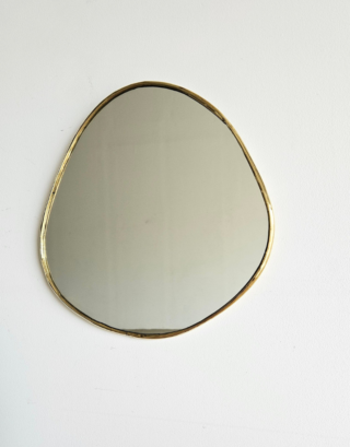 Petit miroir rond irrégulier