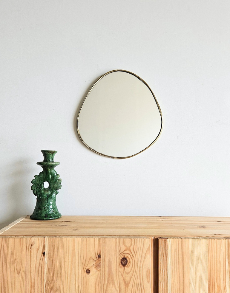Petit miroir rond irrégulier